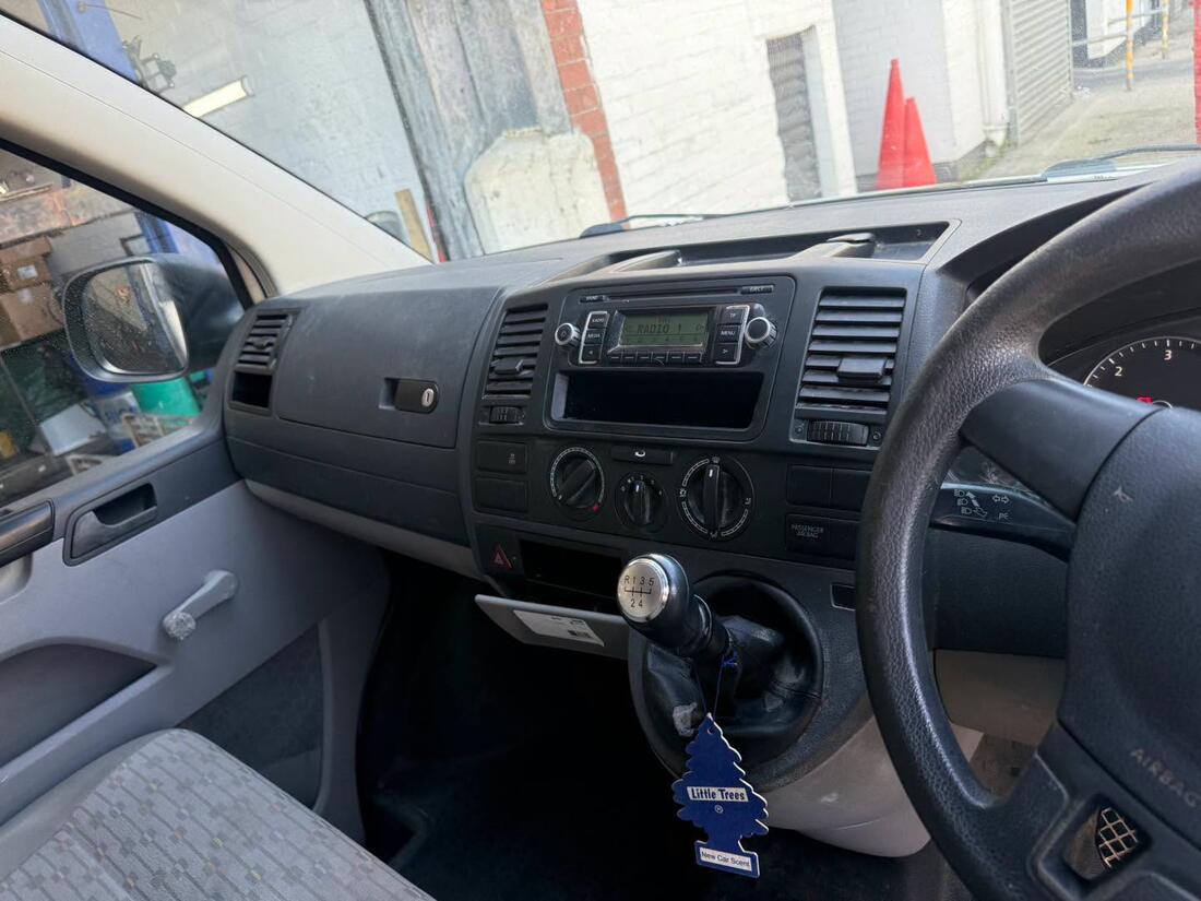VW Transporter T5 dashboard showing the heater controls and fan dial